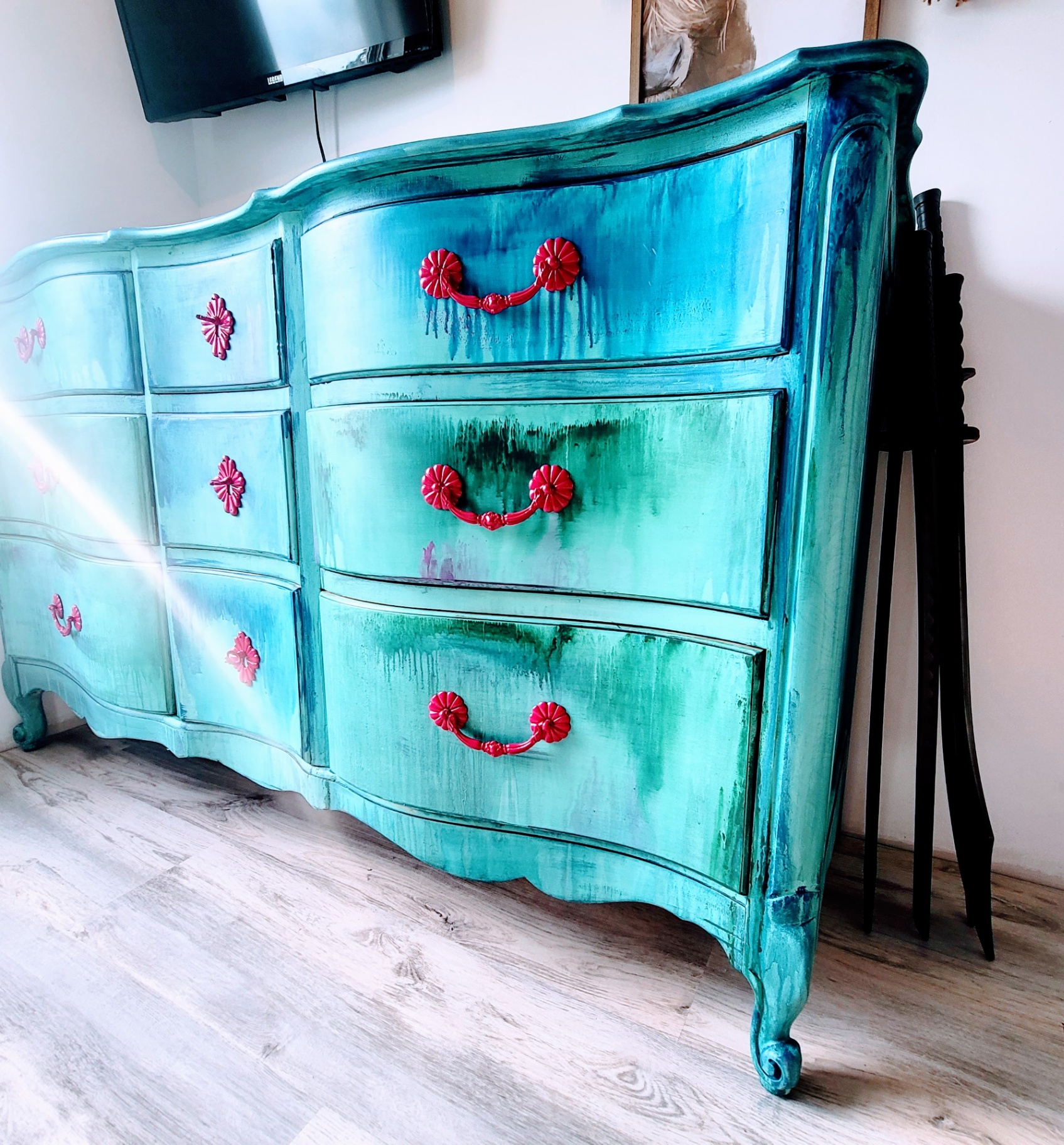 Detail of the dripped patina finish and hand-painted hardware.