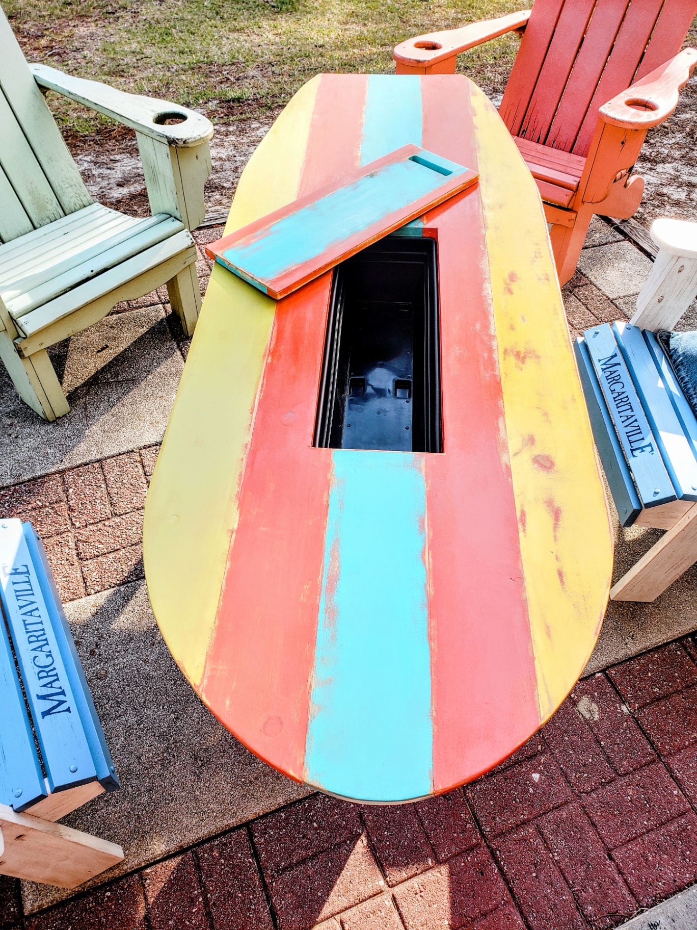 Removable panel revealing the built-in drink trough.
