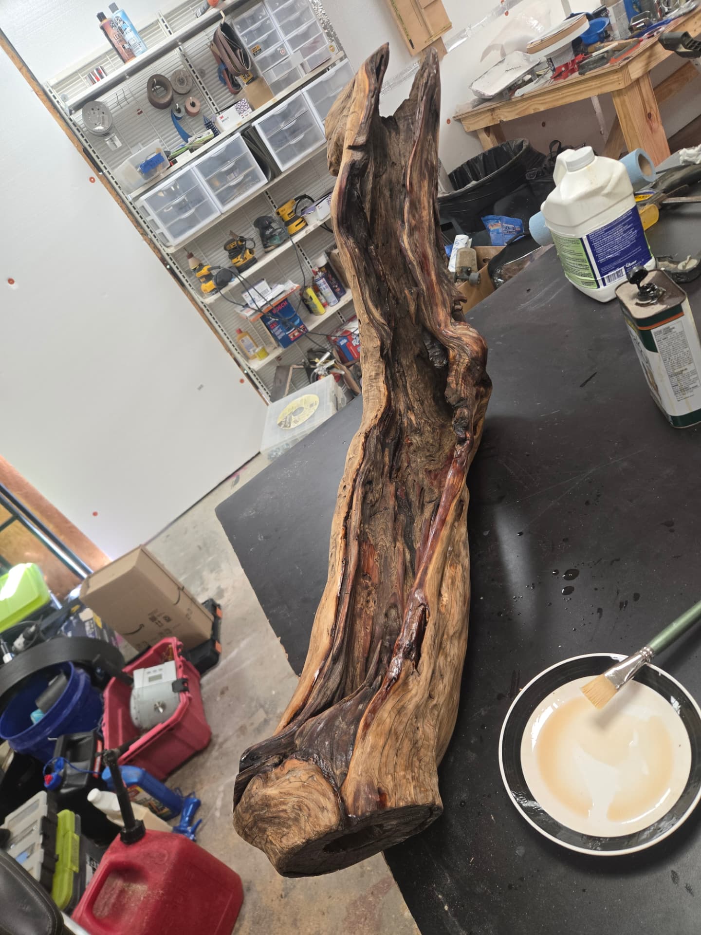 During — the natural grain deepening as the protective finish is applied.