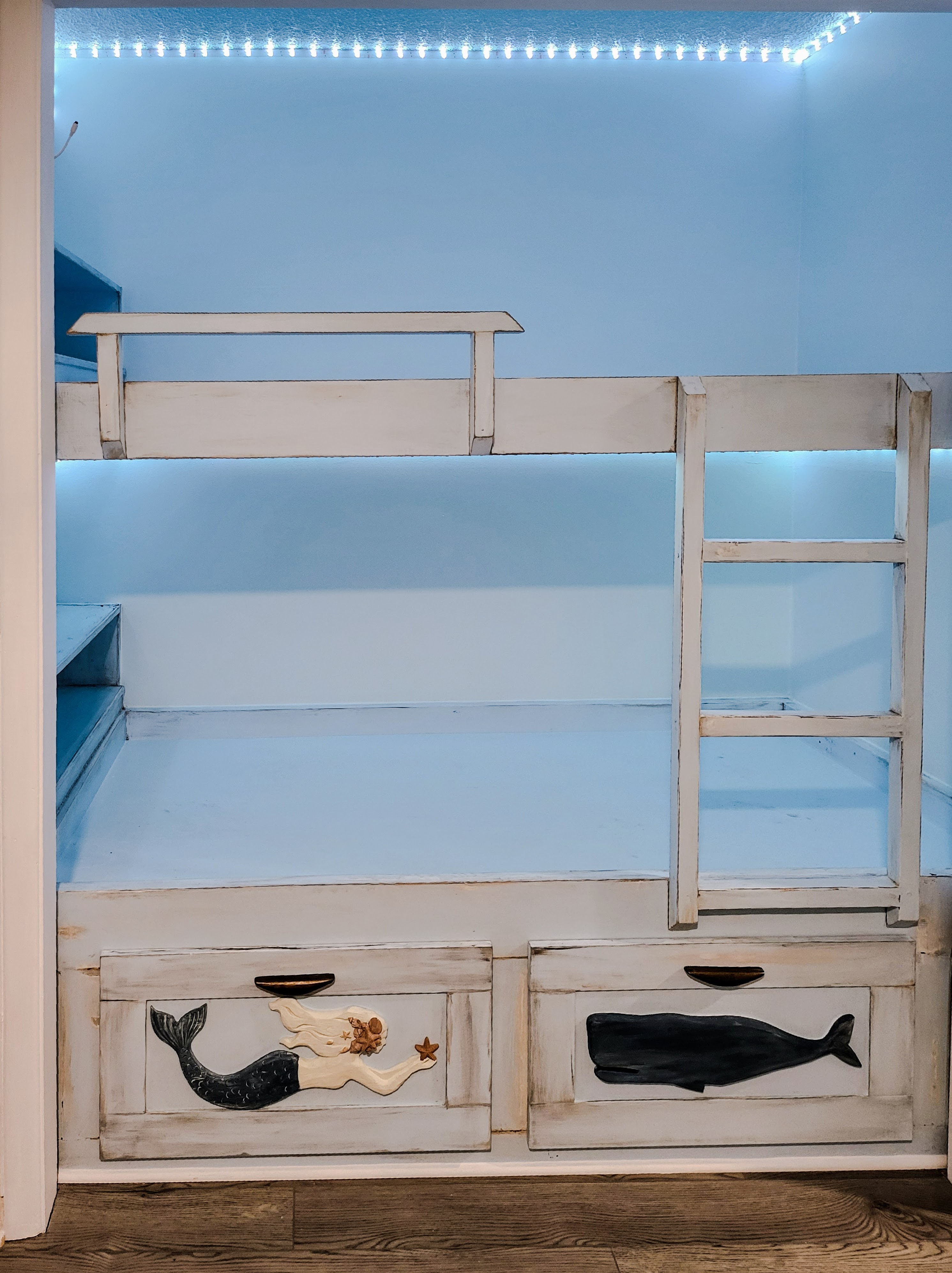The completed structure with new rails and ladder, ready for guests.