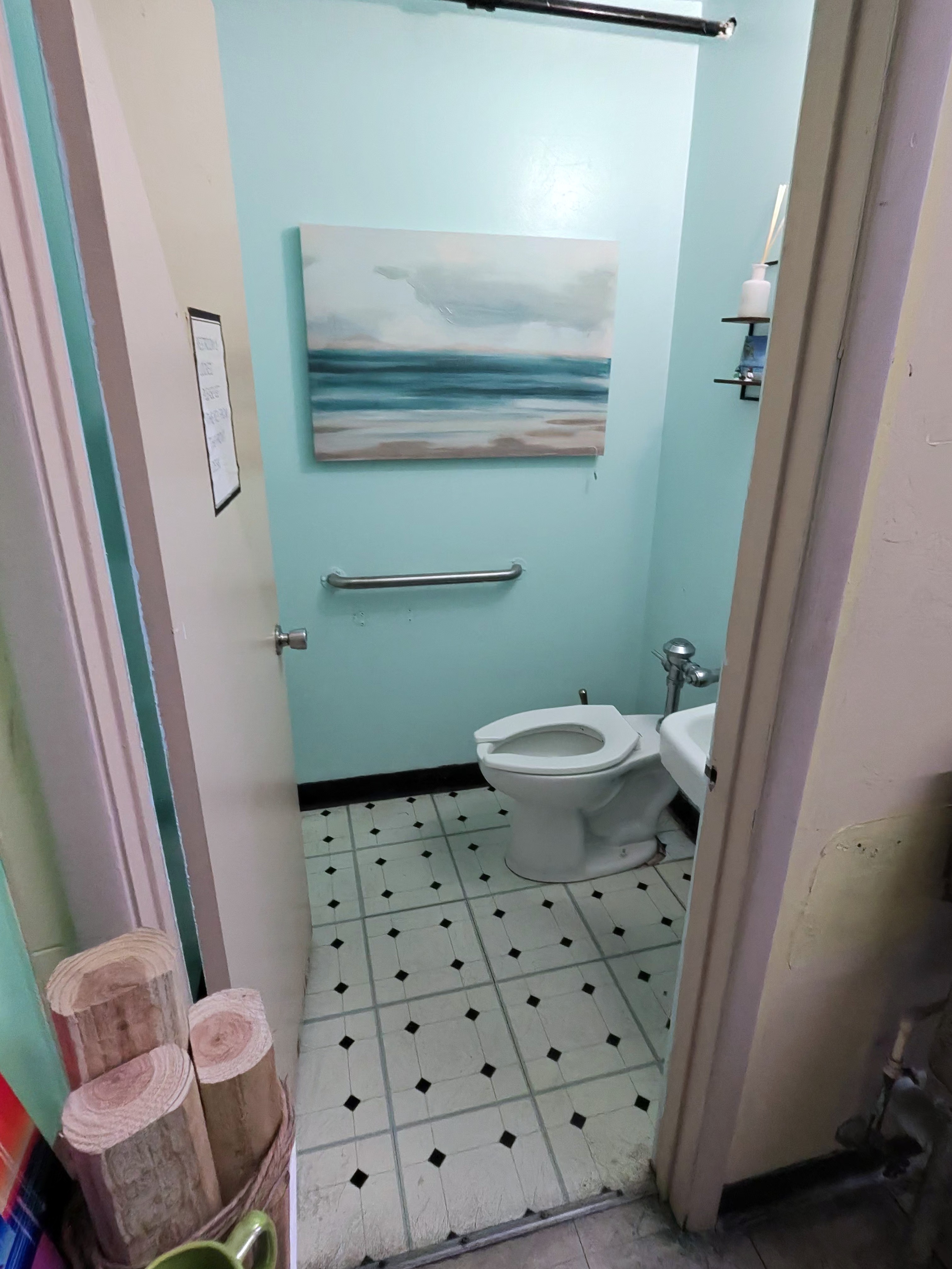 Before — the original bathroom before its underwater transformation.
