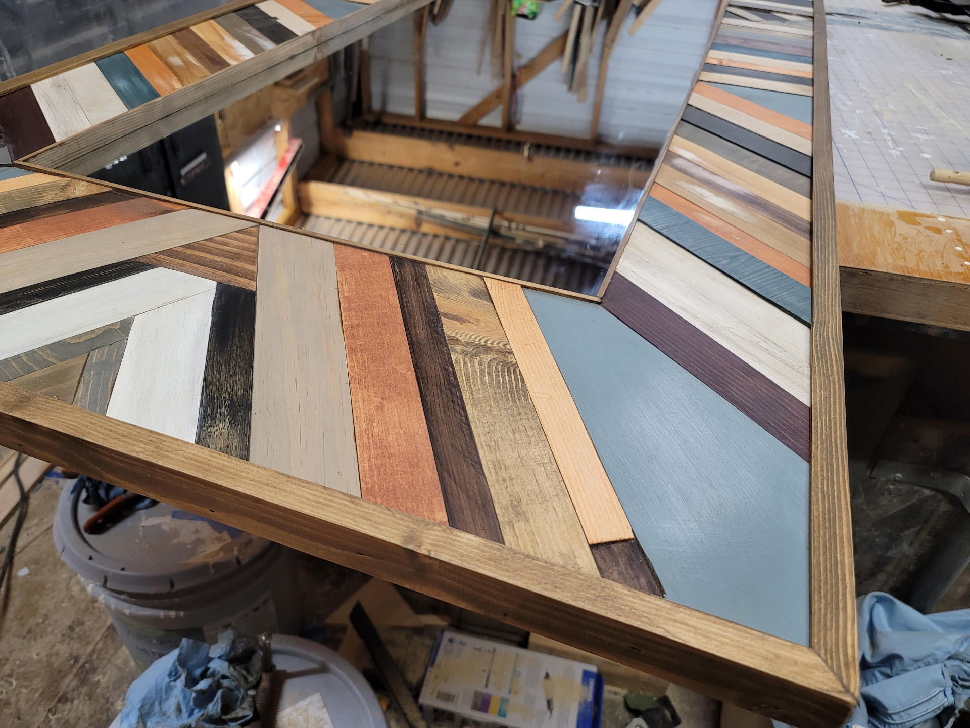 Close-up of the geometric wood pattern and color variation.